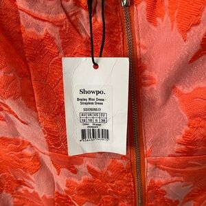 SHOWPO - BRAILEY MINI DRESS - STRAPLESS DRESS IN ORANGE JACQUARD